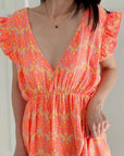 Musselin Kleid, rückenfrei, ärmellos, Palmenblätter, Neon-Orange