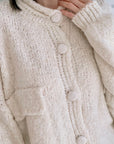 Strickjacke, mit aufgesetzten Taschen, Cremeweiß