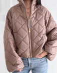 Steppjacke mit Rüschenmanschetten