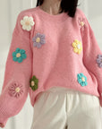 Pullover mit gestickten Blumen