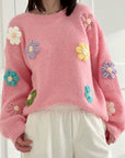 Pullover mit gestickten Blumen