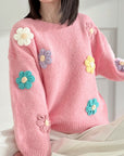 Pullover mit gestickten Blumen