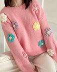 Pullover mit gestickten Blumen