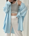 Musselin Bluse, long oversize, Babyblau