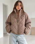 Steppjacke mit Rüschenmanschetten