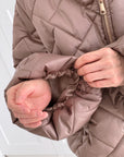 Steppjacke mit Rüschenmanschetten