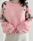 Pullover mit Blumenstickerei